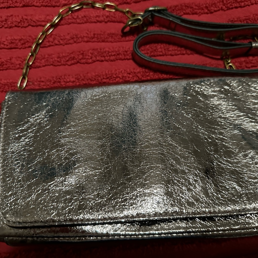Rose gold metallic vinyl clutch